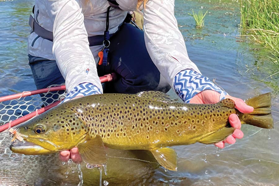 Female angler holding a fish